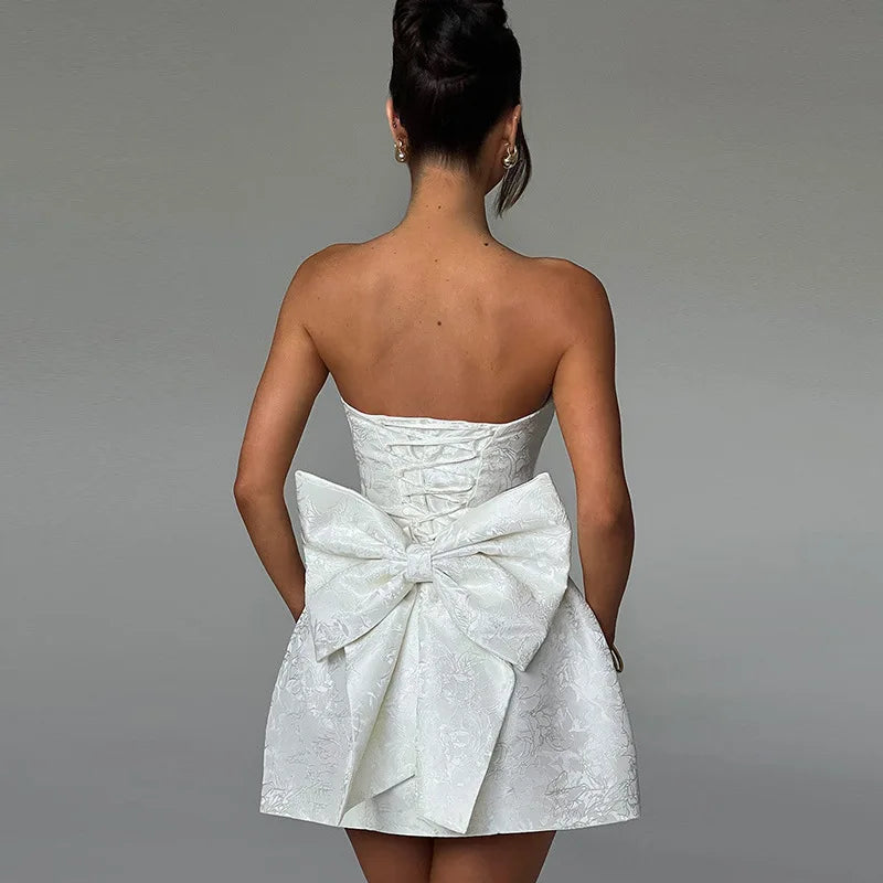 Femmora Backless Bow Mini Dress